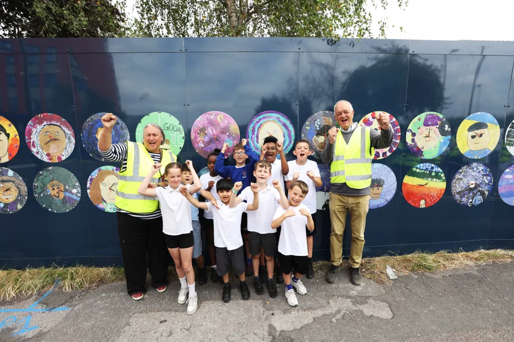 Construction starting at Westlands Drive with pupils from the New Marston Primary School